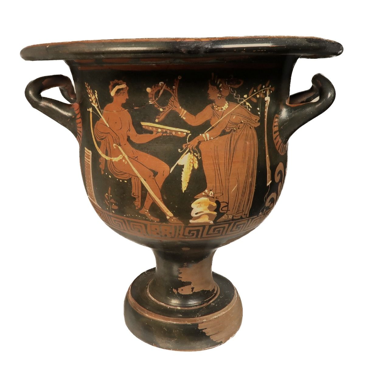 Apulian red-figure bell-krater, side A: a seated youth holding a thyrsus faces a standing woman who offers a wreath, a bunch of grapes between them, above a meander band.