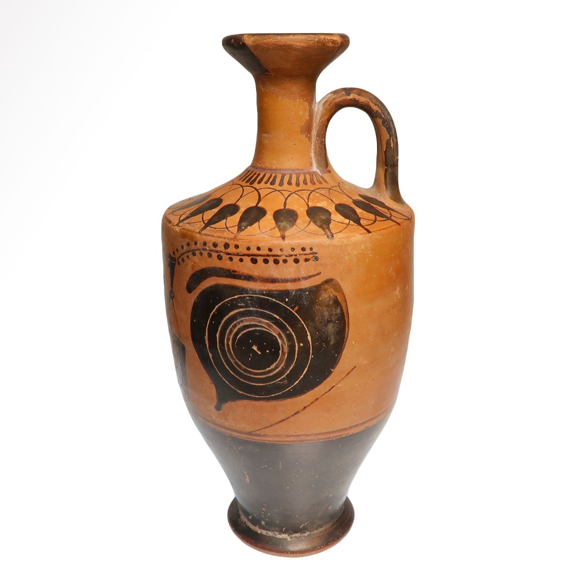 The lekythos turned to the side, showing the strap handle rising from the shoulder to the flaring mouth, one of the two eyes in full, and the angular profile of the wall above the black-gloss lower body and reserved foot.