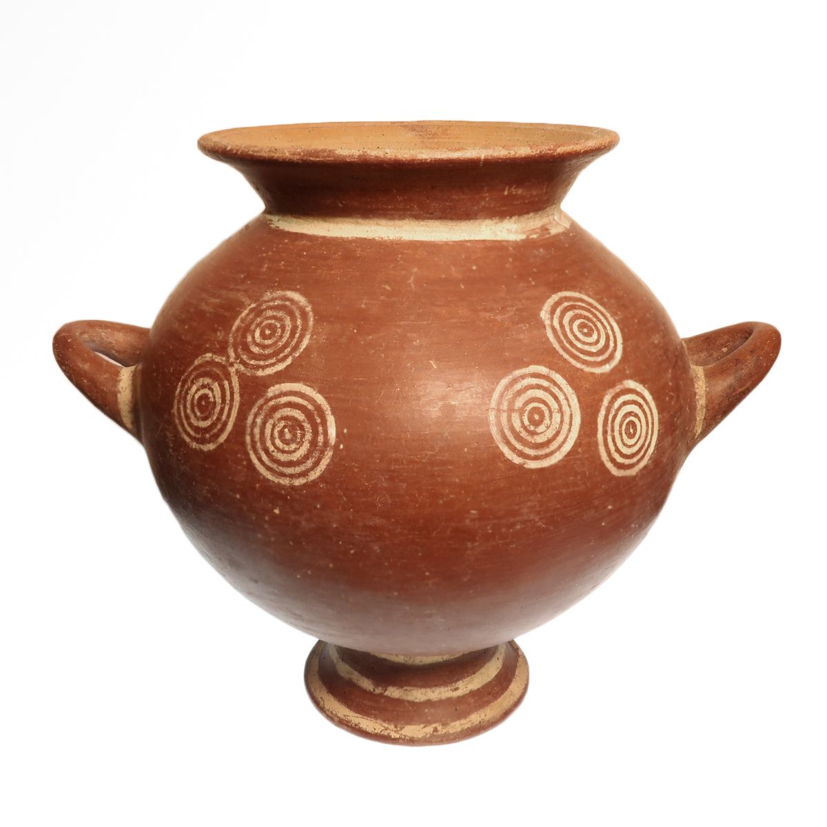 Italo-Geometric stamnoid olla in red impasto, two horizontal handles at the shoulder, decorated with groups of concentric circles in white on the red ground, on a moulded foot.